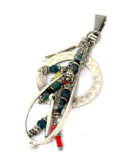 This exquisite cascading gemstone pendant is a stunning addition to your jewelry collection. Its unique interchangeable design allows you to combine different pendants.