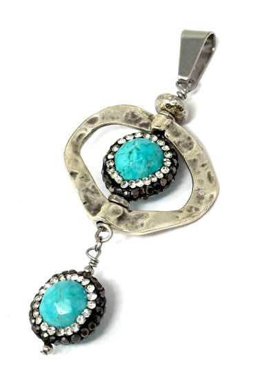 Interchangeable pendant featuring turquoise beads and tiny crystals for mixing and matching jewelry.