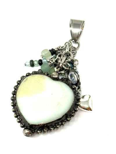 This stunning beaded pendant features dangling beads crafted from a large amazonite gemstone.