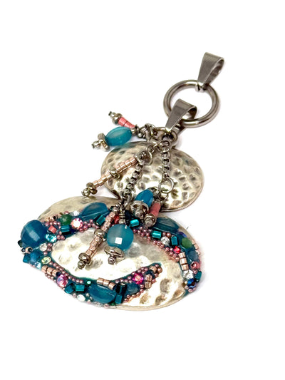 Hand-beaded blue faceted agate pendant with pink and turquoise accent seed beads and crystals.