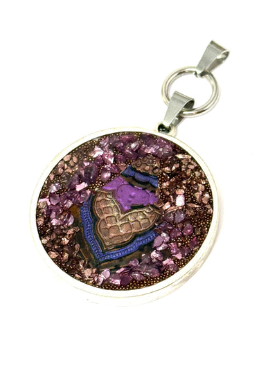 Large circular interchangeable pendant showcases copper and decadent burgundy glass chips.