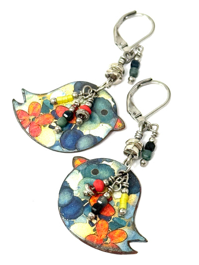 Lightweight bird earrings featuring summer-bright colored floral copper enamel with comfortable lever-back stainless steel closures.