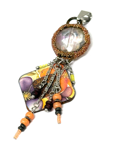 Colorful copper enamel floral focal bead, accented with a hand-beaded crystal quartz bead. Mix and match it with one chain.
