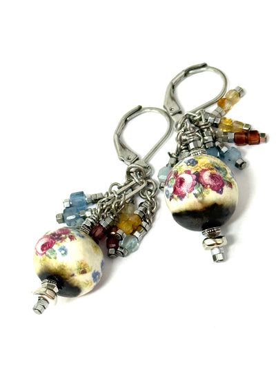 Pretty floral victorian beads that are handmade from Lithuania. Pretty little beads dangling above make these exceptional.