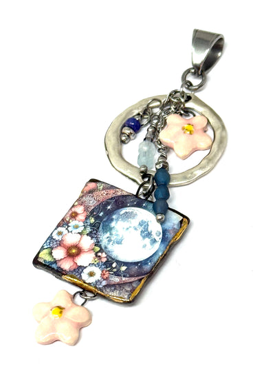 Pretty porcelain floral crescent moon beaded dangle pendant. Slide onto your favorite chain.