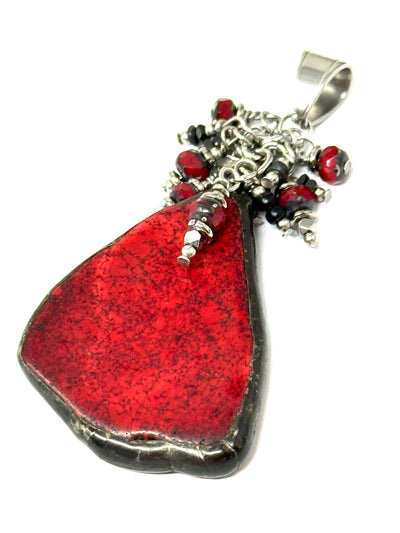 Handmade red magnesite beaded dangle pendant with silver accents, unique statement accessory for any outfit.