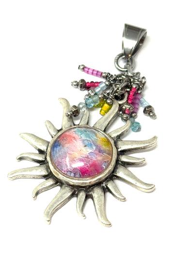 Handmade pastel glass sun beaded dangle pendant featuring colorful beads and a silver sun design.