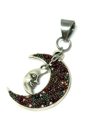 Handmade pearl and crystal crescent moon pendant with a silver face, ideal for daily style and special occasions.