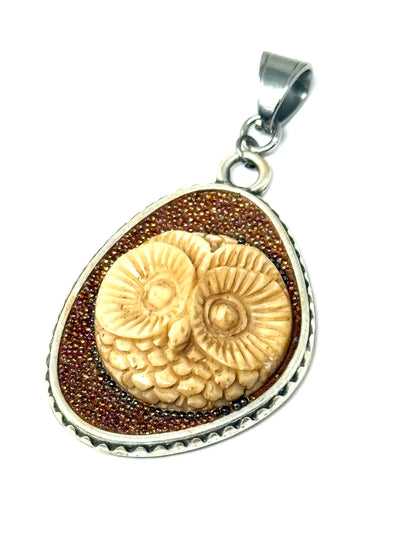 Handmade Hand-Carved Owl Tiny Beaded Pendant Necklace showcasing an intricate owl design with beaded details.
