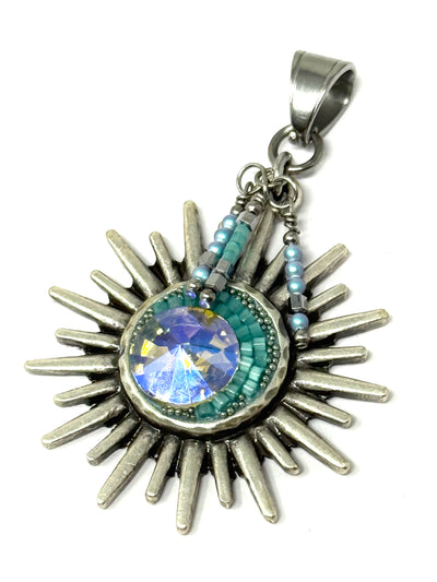 Handmade Crystal Seed Bead Sun Pendant Necklace featuring silver sunburst design and colorful seed beads.