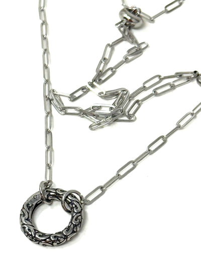 Adjustable stainless steel oval link chain necklace with a textured silver circle pendant bail, perfect for women's jewelry layering. Bead Dangle Design.