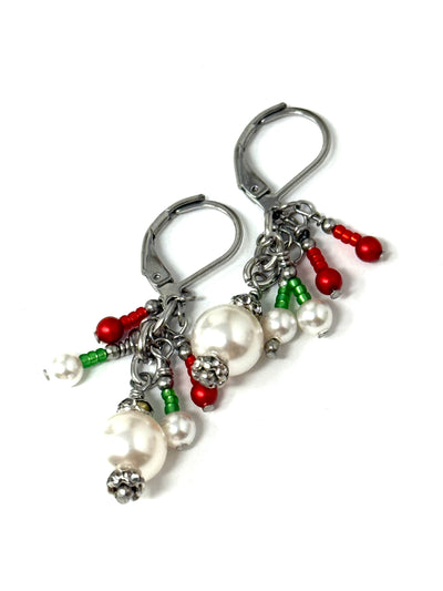 White Swarovski pearl holiday earrings with red and green glass seed beads, stainless steel leverback ear wires, front view showing elegant pearl clusters and festive color accents