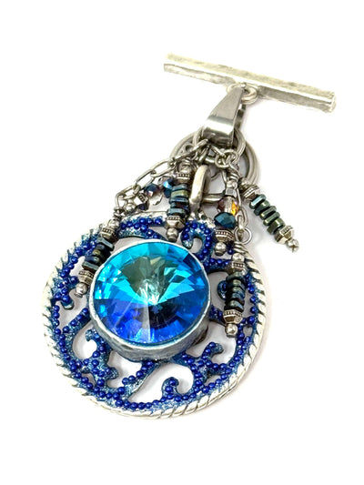 Handmade Crystal Blue Filigree Beaded Interchangeable Pendant showcasing vibrant blue gem with silver accents and stainless steel chain connector.