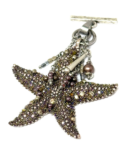 Handmade starfish hand-beaded interchangeable pendant necklace featuring intricate beadwork and a sparkling design.