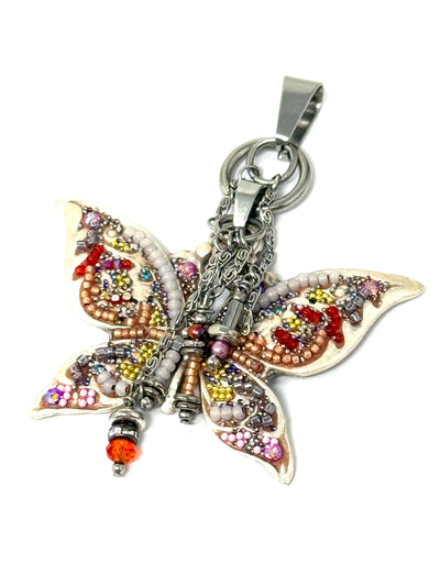 Create your own unique style by mixing and matching this beautiful, colorful butterfly hand beaded pendant with chain of your choice.