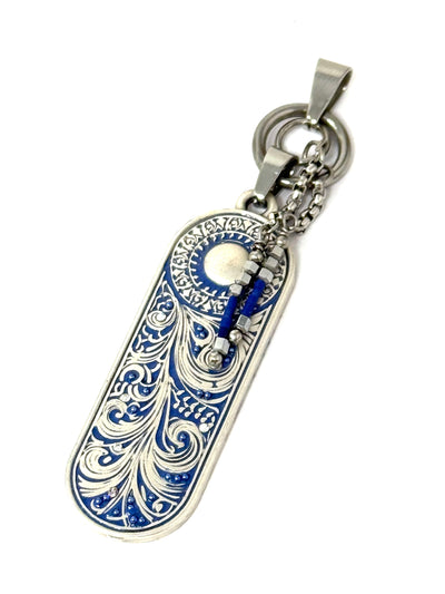Deep blue pendant featuring small seed beads and dangling hematite beads. Tiny crystals add a touch of sparkle.