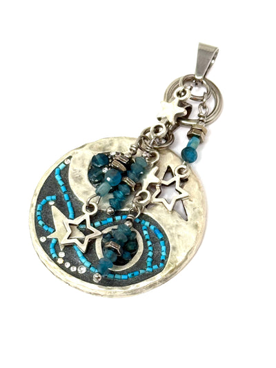 Hand-beaded star pendant featuring long hanging beads of apatite gemstones. Intricate beading and an interchangeable design.
